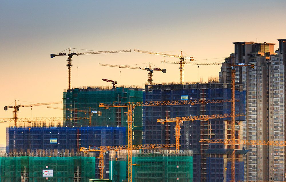 Stock image of construction cranes