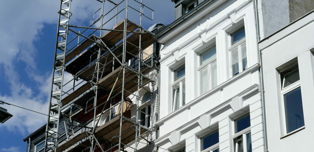 Advisory-Office-to-residential-six myths-building renovation renovated and scaffolded not renovated old building